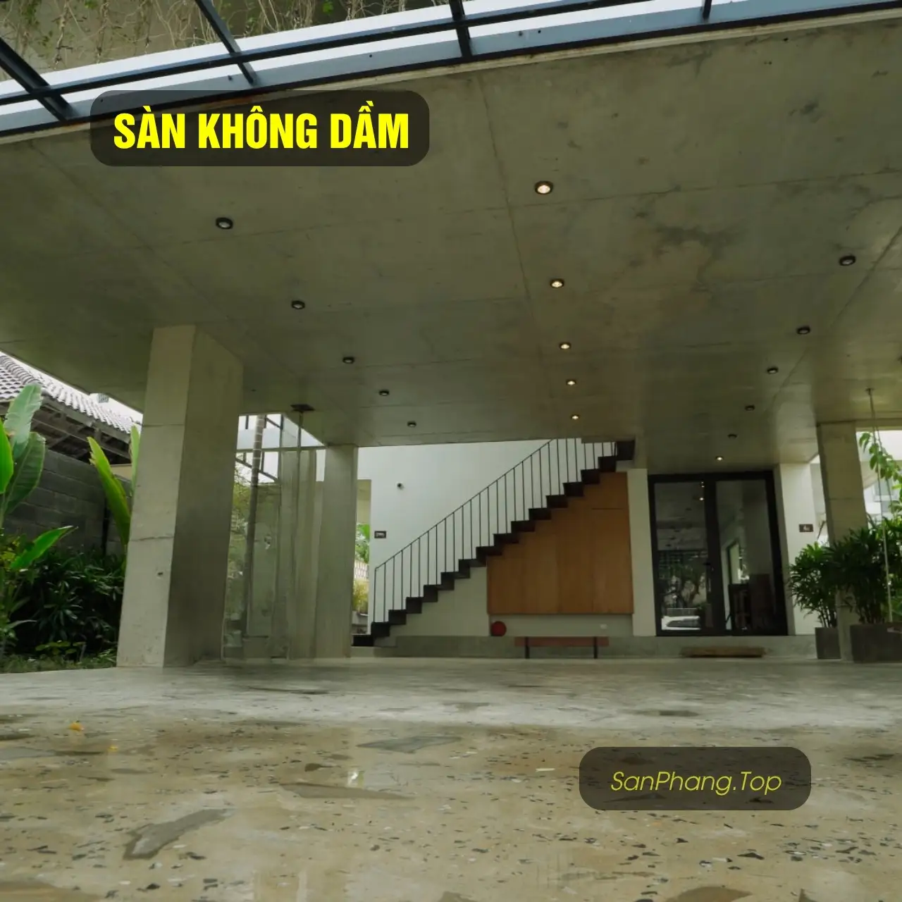 A couch with a blanket on top of it